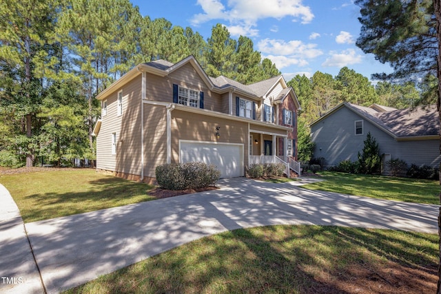 front facade featuring a garage and a front lawn