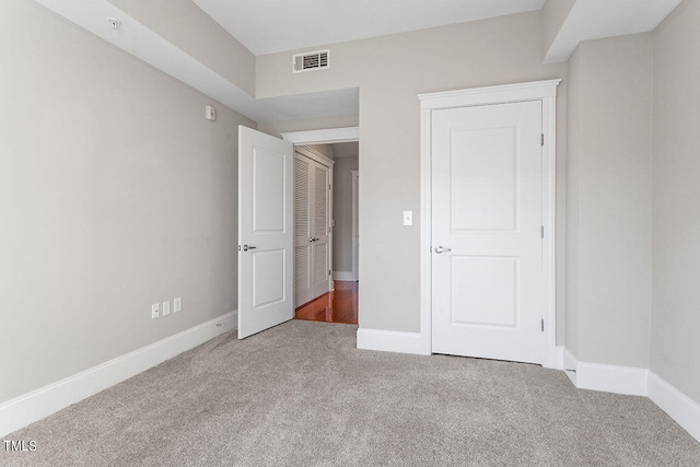 unfurnished bedroom with carpet