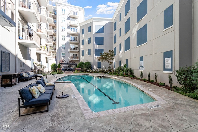 view of pool with a patio