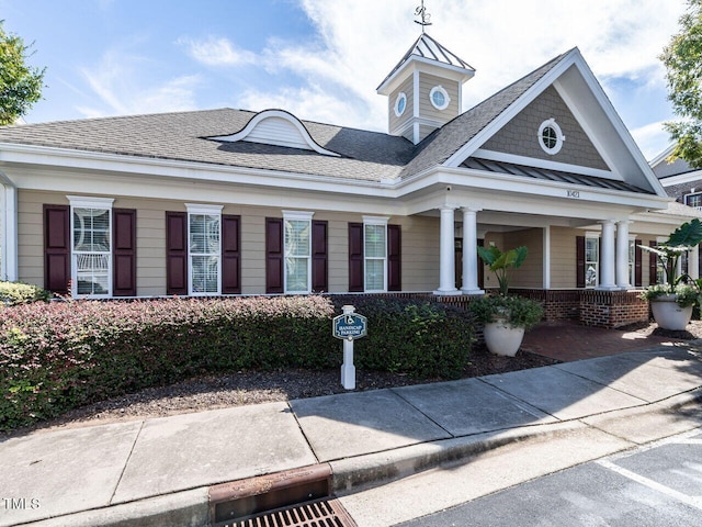 view of front of home featuring covered porch