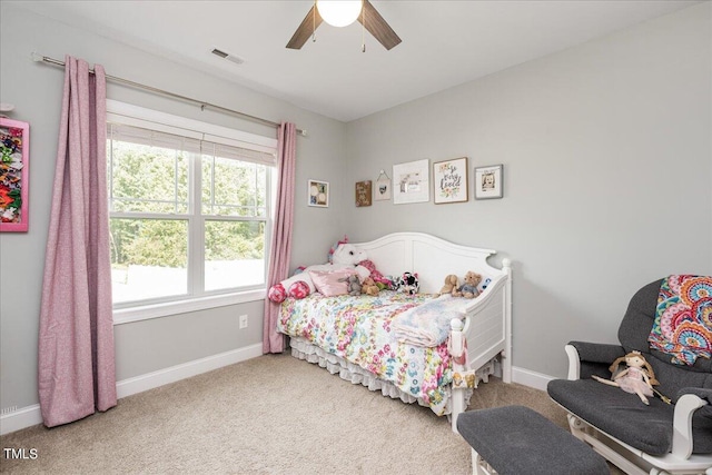 bedroom with ceiling fan and carpet flooring