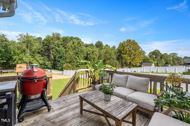 deck featuring a lawn