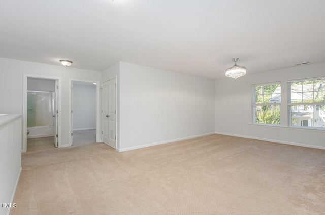 517 Birchrun Dr, Durham, NC 27712 - spare room featuring light colored carpet and baseboards