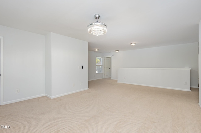517 Birchrun Dr, Durham, NC 27712 - unfurnished living room with light colored carpet and baseboards