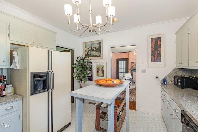 kitchen featuring ornamental molding, stainless steel dishwasher, decorative light fixtures, white refrigerator with ice dispenser, and an inviting chandelier