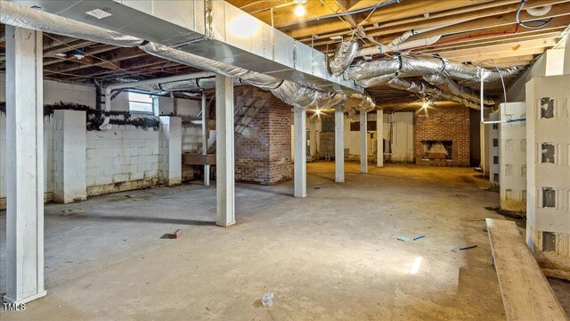 basement featuring a fireplace