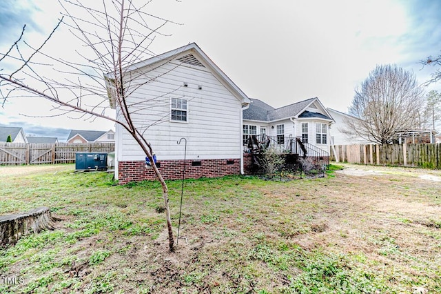 exterior space with a yard and a deck