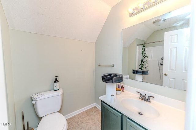 bathroom featuring walk in shower, vanity, vaulted ceiling, and toilet