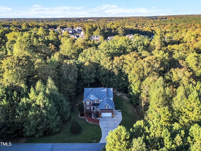 319 River Knoll Dr, Clayton, NC 27527 - drone / aerial view with a wooded view