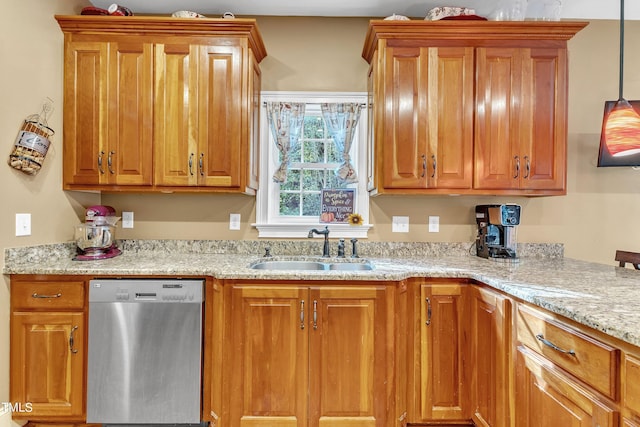 319 River Knoll Dr, Clayton, NC 27527 - kitchen featuring stainless steel dishwasher, brown cabinetry, and a sink