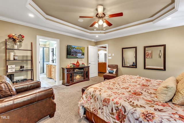 319 River Knoll Dr, Clayton, NC 27527 - bedroom with ornamental molding, a raised ceiling, a glass covered fireplace, and light carpet