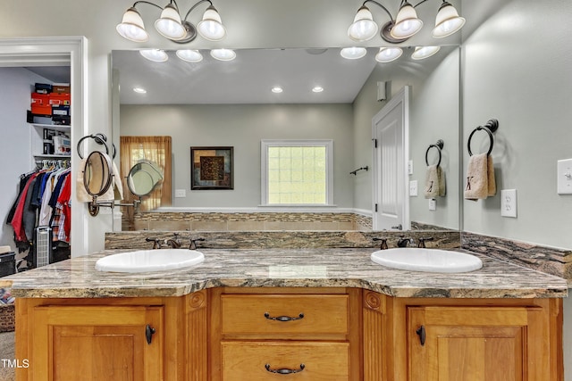 319 River Knoll Dr, Clayton, NC 27527 - full bathroom with double vanity and a sink