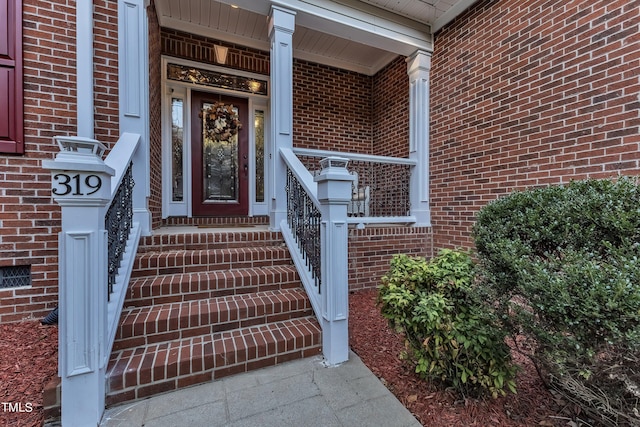 319 River Knoll Dr, Clayton, NC 27527 - view of exterior entry featuring brick siding