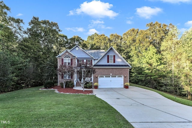 319 River Knoll Dr, Clayton, NC 27527 - view of front facade with a front yard, brick siding, driveway, and an attached garage