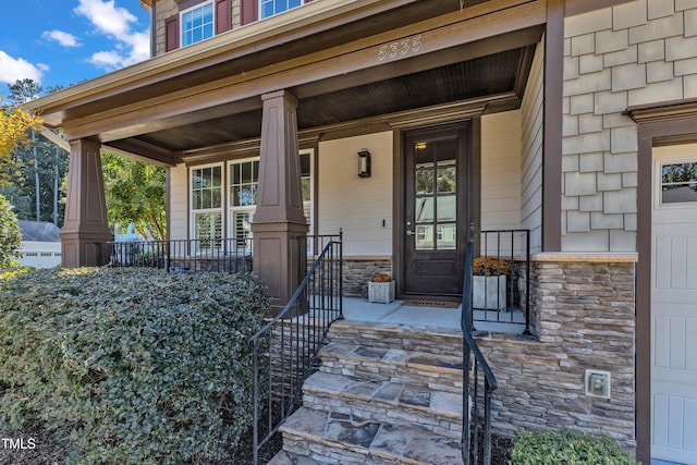 entrance to property with covered porch