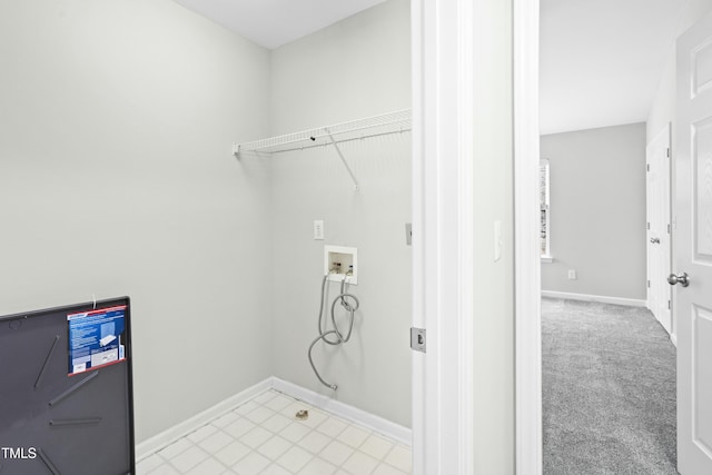 laundry room featuring washer hookup and light colored carpet