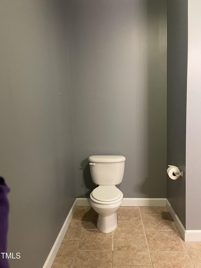 bathroom featuring toilet