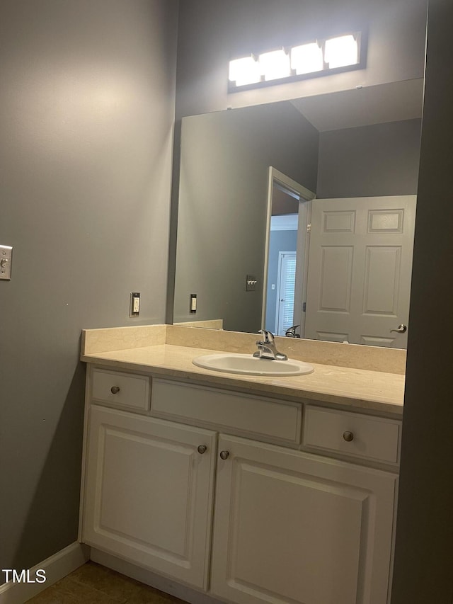 bathroom with vanity and tile patterned flooring