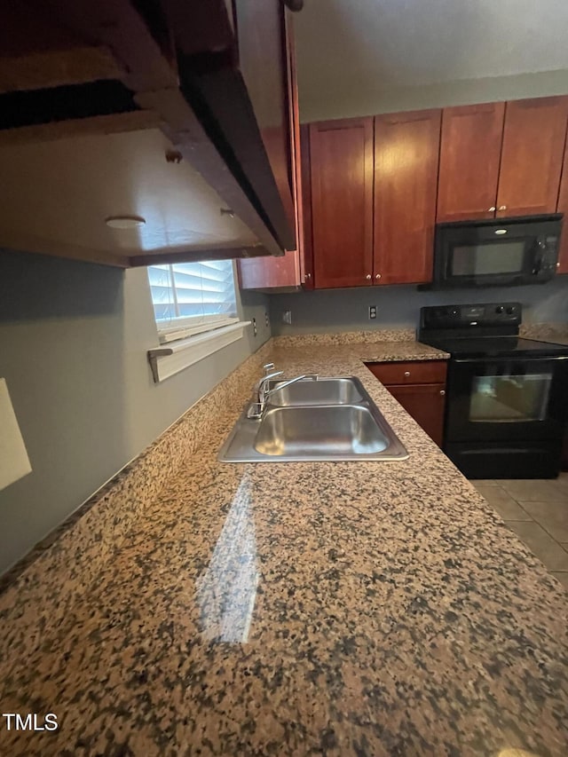 kitchen with sink and black appliances