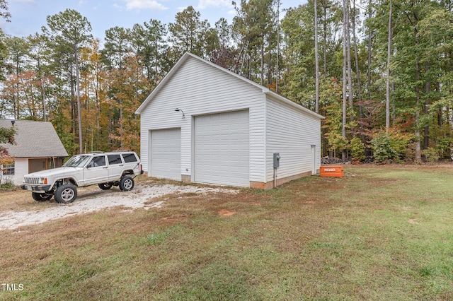 garage with a lawn