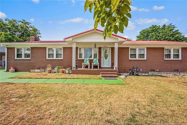 ranch-style home with a front yard and a porch