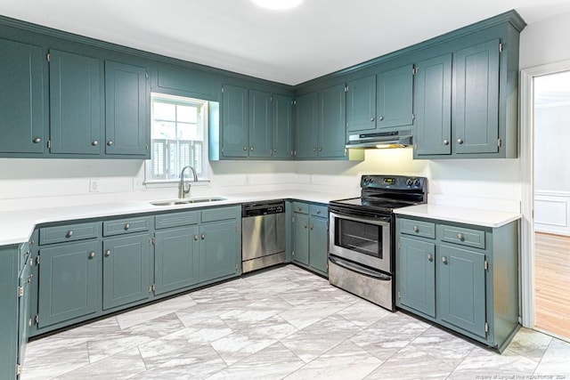 kitchen with light hardwood / wood-style floors, sink, and stainless steel appliances