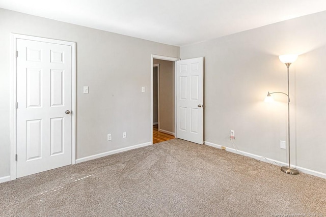 unfurnished bedroom featuring carpet flooring