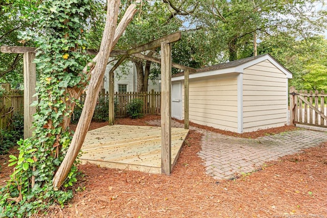 view of patio / terrace with a storage unit