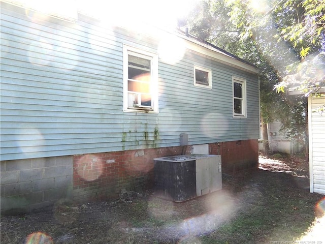 view of property exterior featuring central AC unit