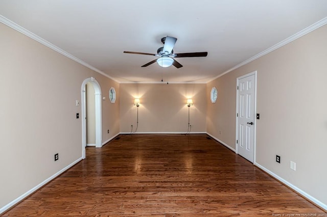 empty room with ceiling fan, crown molding, and dark hardwood / wood-style flooring