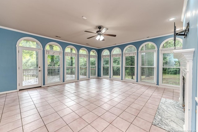 interior space with ceiling fan and plenty of natural light