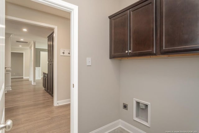 5737 Pooh Ave, Stedman, NC 28391 - laundry area featuring hookup for an electric dryer, cabinet space, light wood-type flooring, baseboards, and recessed lighting