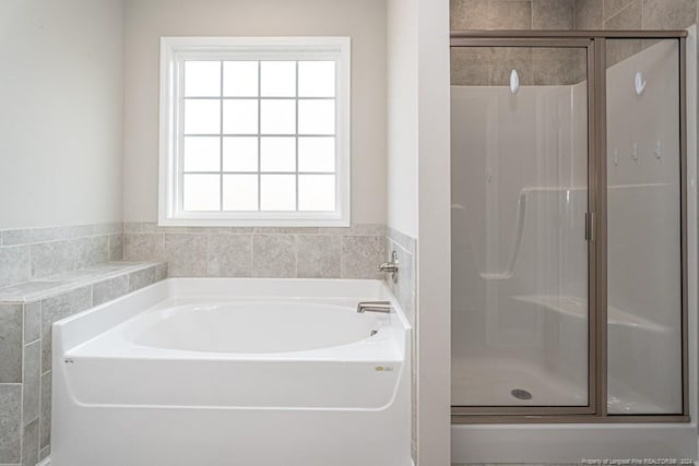 5737 Pooh Ave, Stedman, NC 28391 - bathroom featuring a shower stall and a garden tub