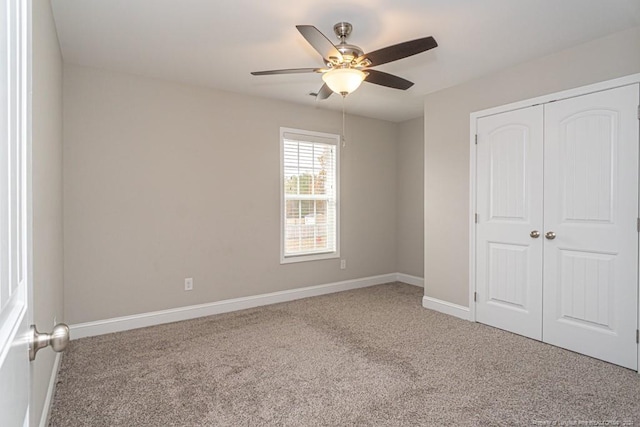 5737 Pooh Ave, Stedman, NC 28391 - unfurnished bedroom featuring carpet, a closet, baseboards, and a ceiling fan