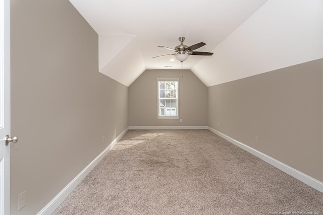 5737 Pooh Ave, Stedman, NC 28391 - additional living space with light carpet, a ceiling fan, lofted ceiling, and baseboards