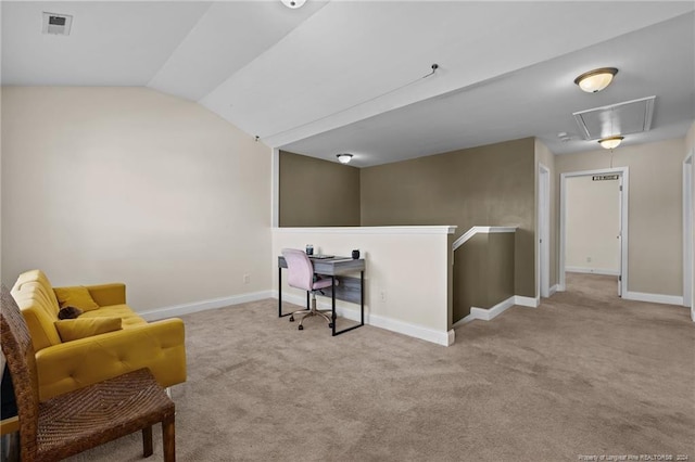 living area featuring lofted ceiling and light carpet