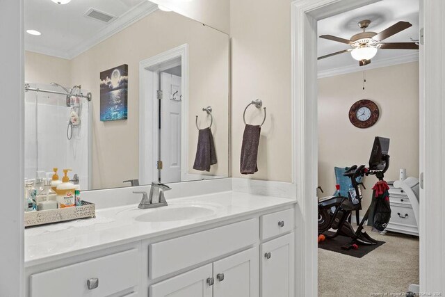 bathroom with ceiling fan, crown molding, vanity, and a shower with curtain