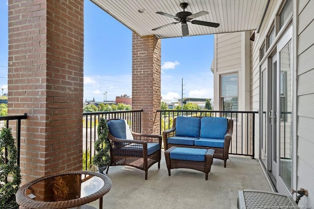 balcony with an outdoor hangout area and ceiling fan