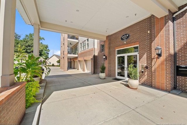 view of patio / terrace featuring a garage