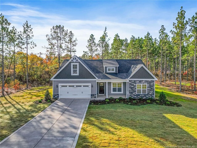 craftsman-style home with a garage and a front lawn