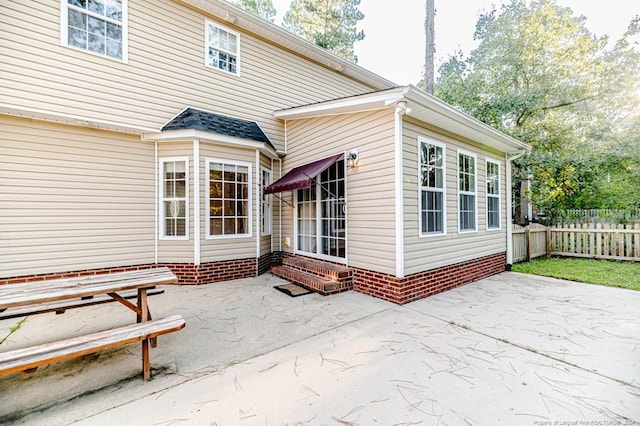 rear view of property with a patio area