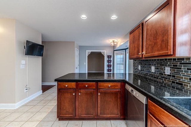 3375 Carolina Way, Sanford, NC 27332 - kitchen featuring stainless steel dishwasher, a peninsula, tasteful backsplash, light tile patterned floors, and baseboards