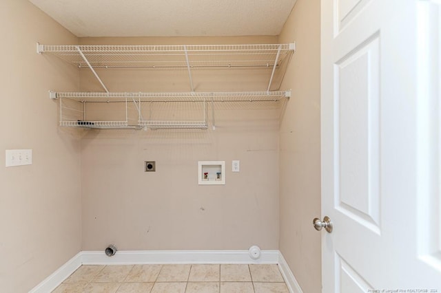 3375 Carolina Way, Sanford, NC 27332 - washroom featuring hookup for an electric dryer, baseboards, tile patterned floors, and washer hookup