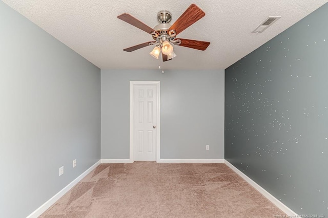 3375 Carolina Way, Sanford, NC 27332 - empty room with a ceiling fan, light carpet, a textured ceiling, and baseboards