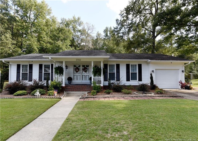 3760 Berkley Ln, Lumberton, NC 28358 - single story home with covered porch, an attached garage, a front lawn, and driveway