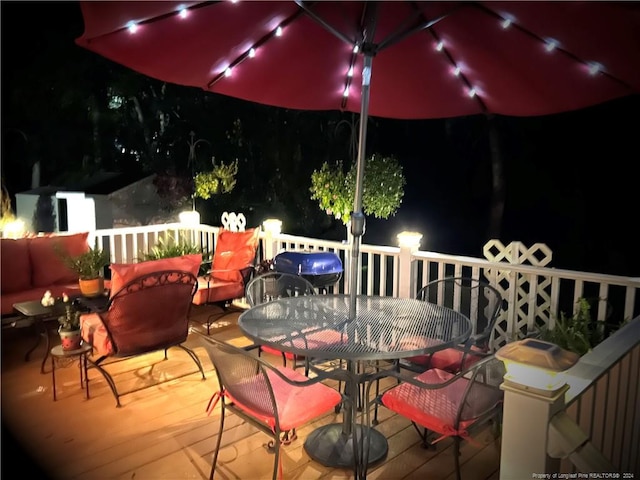 view of deck at twilight