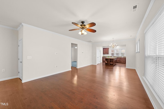 unfurnished living room featuring dark hardwood / wood-style flooring, ornamental molding, and ceiling fan with notable chandelier