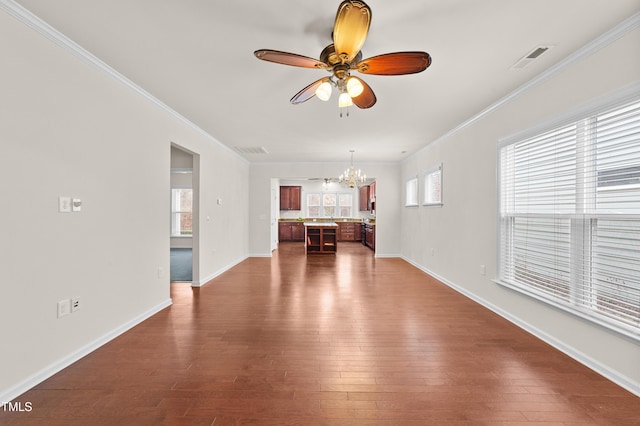 unfurnished living room featuring crown molding, dark hardwood / wood-style floors, and ceiling fan with notable chandelier