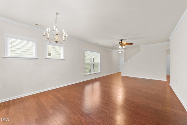 spare room featuring dark hardwood / wood-style flooring, crown molding, and ceiling fan with notable chandelier