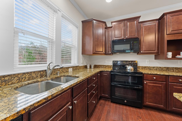 kitchen with black appliances, light stone countertops, sink, crown molding, and dark hardwood / wood-style floors